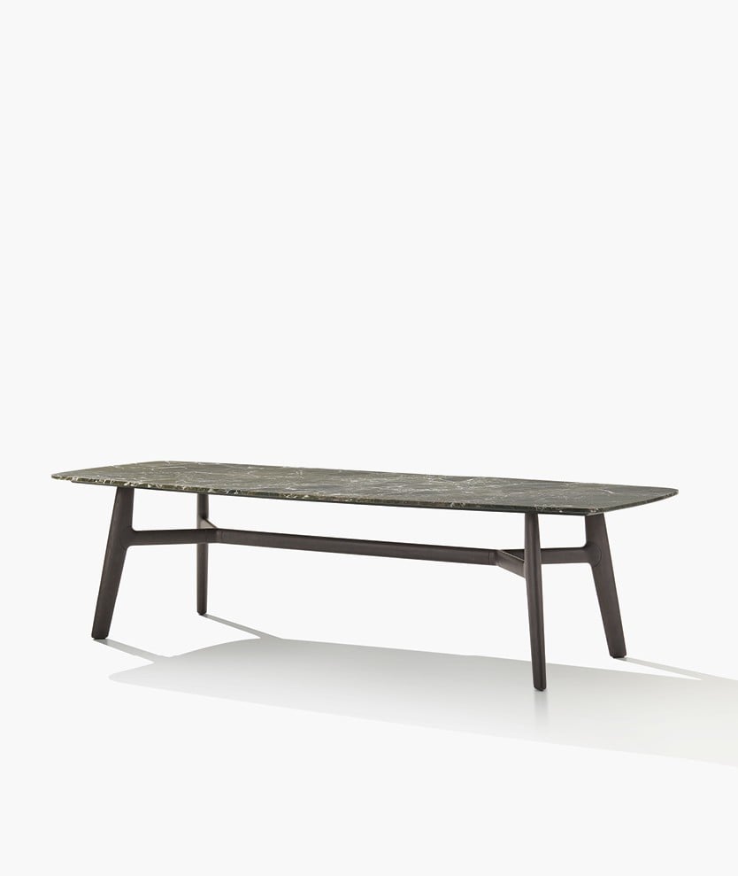 Curve table with honed green lepanto marble top and black elm structure.