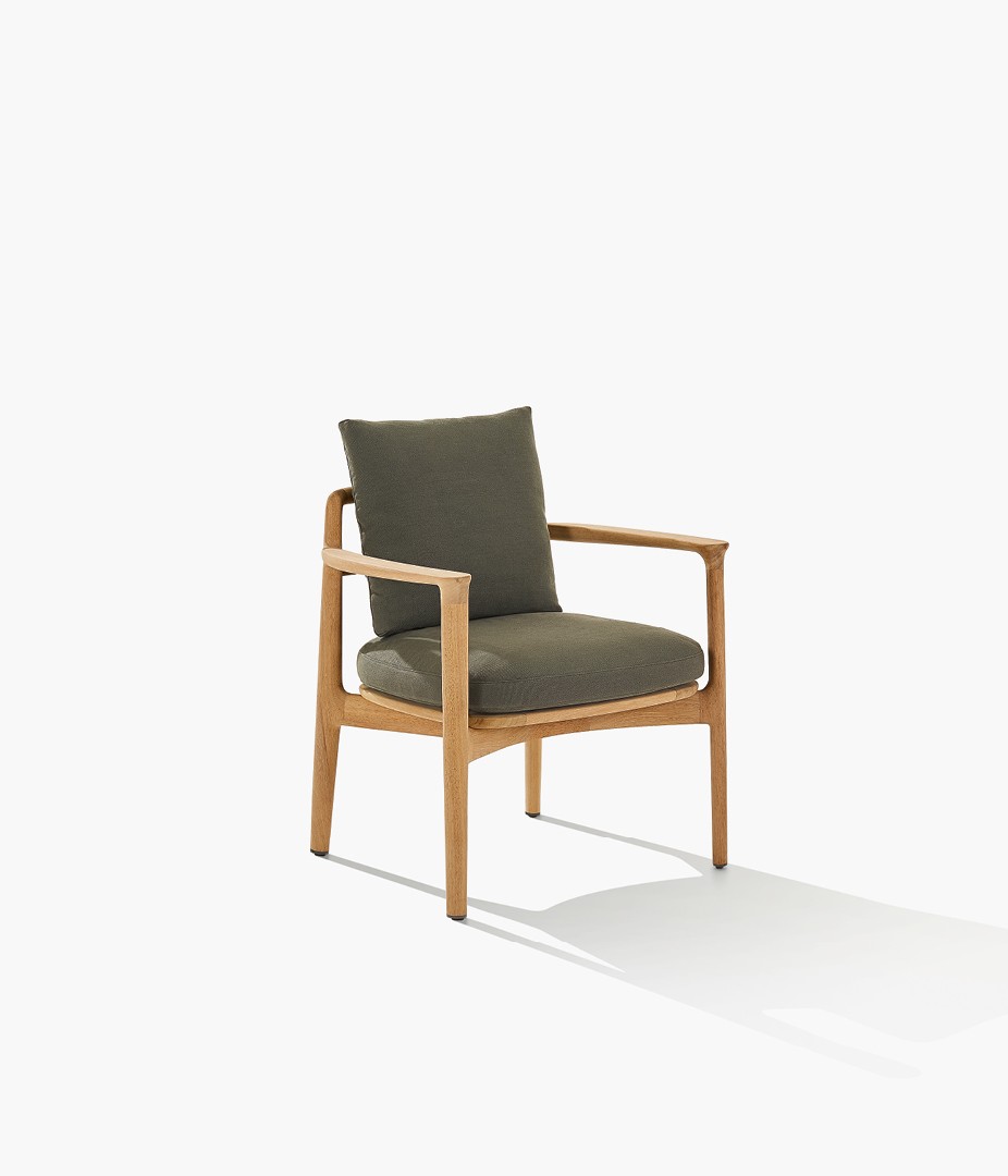 Magnolia chair with solid wood frame in natural iroko and removable cover in Merak 106 bosco fabric.