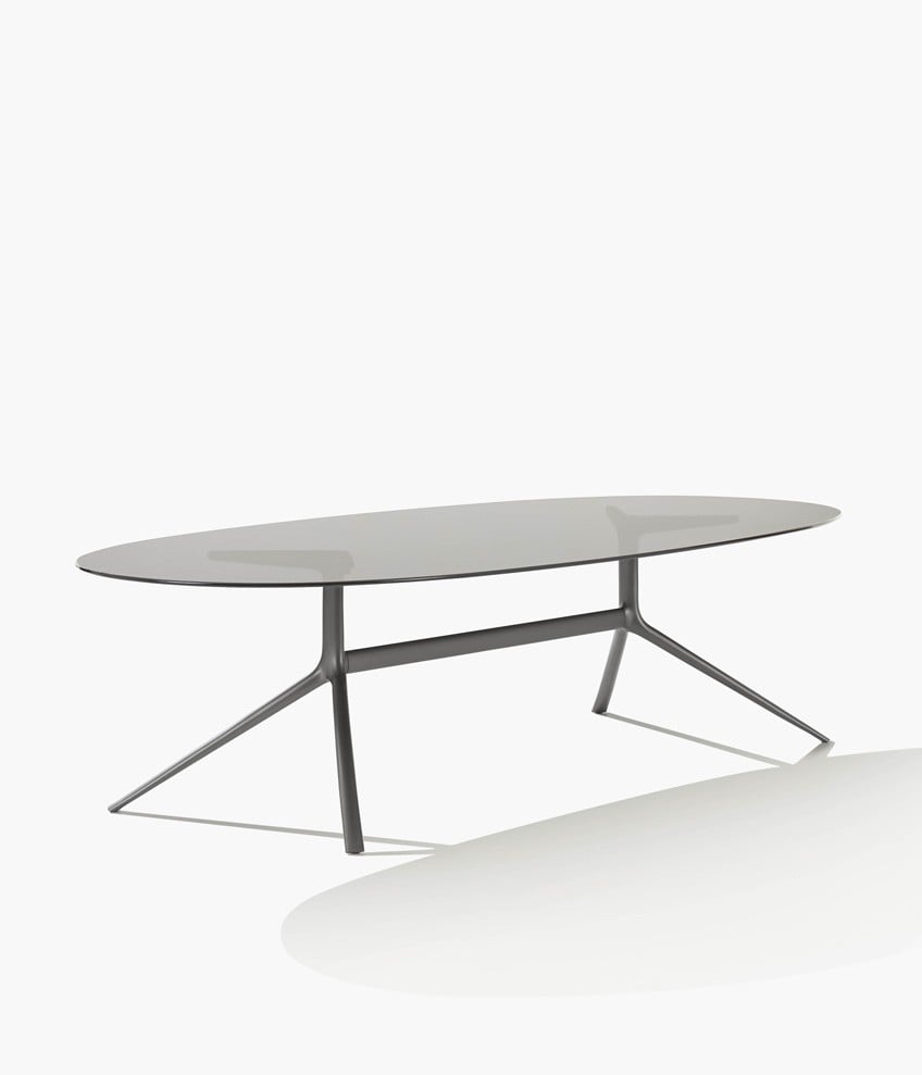 Mondrian table with top in fumé glass and mat brown nickel structure.