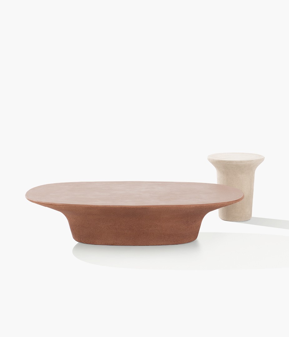 Reef coffee tables in Cementoraw® in the colours terracotta and crema.