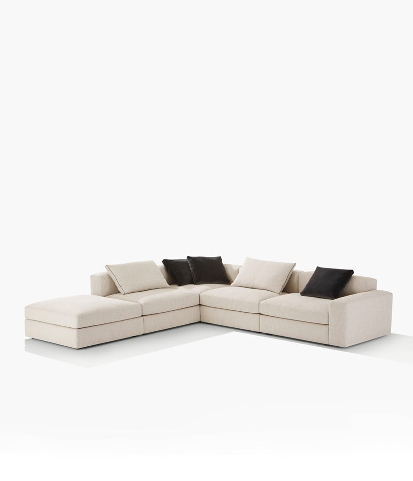 Dune sofa with removable cover in fabric Skyros 02 sabbia, cushions in fabric Skyros 02 sabbia and velvet Persia 1404 carbone with border in gros- grain nero.